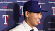May 18, 2025; Arlington, Texas, USA; Seong-Jun Kim of the Texas Rangers talks to the media after signing with the team before the game against the Houston Astros at Globe Life Field