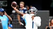 Oct 12, 2025; Paradise, Nevada, USA; Tennessee Titans quarterback Cam Ward (1) warms up before the game against the Las Vegas Raiders at Allegiant Stadium. Mandatory Credit: Stephen R. Sylvanie-Imagn Images