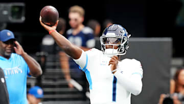 Oct 12, 2025; Paradise, Nevada, USA; Tennessee Titans quarterback Cam Ward (1) warms up before the game against the Las Vegas Raiders at Allegiant Stadium. Mandatory Credit: Stephen R. Sylvanie-Imagn Images