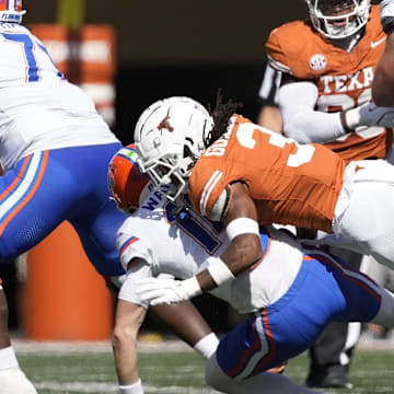 Nov 9, 2024; Austin, Texas, USA; Texas Longhorns defensive back Jaylon Guilbeau (3) sacks Florida Gators Aidan Warner (16) during the first half at Darrell K Royal-Texas Memorial Stadium. Mandatory Credit: Scott Wachter-Imagn Images