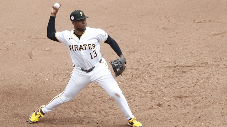 Jul 21, 2024; Pittsburgh, Pennsylvania, USA;  Pittsburgh Pirates third baseman Ke'Bryan Hayes (13) throws to first base to retire Philadelphia Phillies right fielder Nick Castellanos (not pictured) during the sixth inning at PNC Park. The Phillies won 6-0. Mandatory Credit: Charles LeClaire-USA TODAY Sports