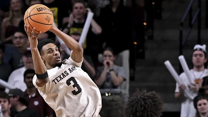 Feb 18, 2026; College Station, Texas, USA; Texas A&M Aggies guard Rylan Griffen (3) secures a rebound during the second half against the Ole Miss Rebels at Reed Arena. Mandatory Credit: Maria Lysaker-Imagn Images 