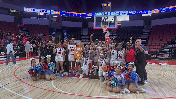 Kenwood girls basketball celebrates its first state title after beating Fremd 65-44 in the IHSA Class 4A final on March 8 at CEFCU Arena in Normal. 