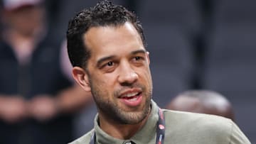 Atlanta Hawks general manager Landry Fields looks on against the Charlotte Hornets.