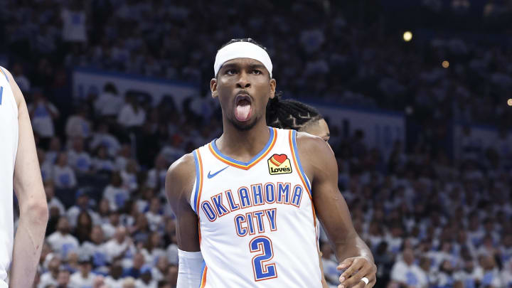 Apr 21, 2024; Oklahoma City, Oklahoma, USA; Oklahoma City Thunder guard Shai Gilgeous-Alexander (2) reacts to forward Chet Holmgren (7) blocking a shot by a New Orleans Pelicans player during the second quarter of game one of the first round for the 2024 NBA playoffs at Paycom Center. Mandatory Credit: Alonzo Adams-USA TODAY Sports