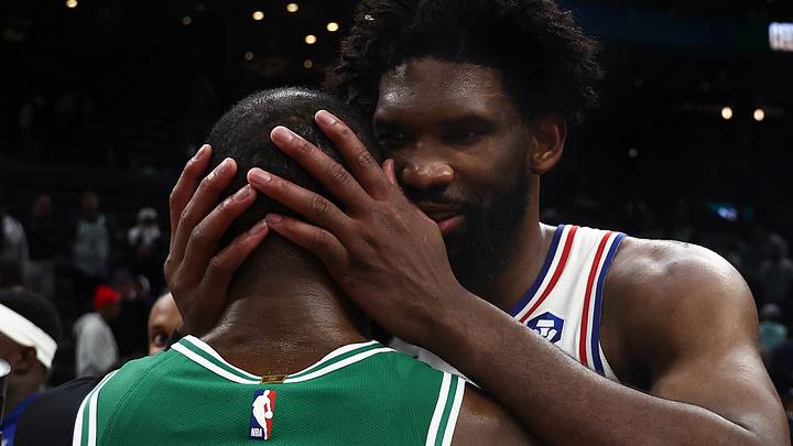 May 2, 2026; Boston, Massachusetts, USA; Philadelphia 76ers center Joel Embiid (21) talks with Boston Celtics guard Jaylen Brown (7) following game seven of the first round of the 2026 NBA Playoffs at TD Garden. Mandatory Credit: Winslow Townson-Imagn Images