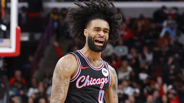 Jan 24, 2026; Chicago, Illinois, USA; Chicago Bulls guard Coby White (0) reacts after scoring against the Boston Celtics during the first half at United Center. Mandatory Credit: Kamil Krzaczynski-Imagn Images
