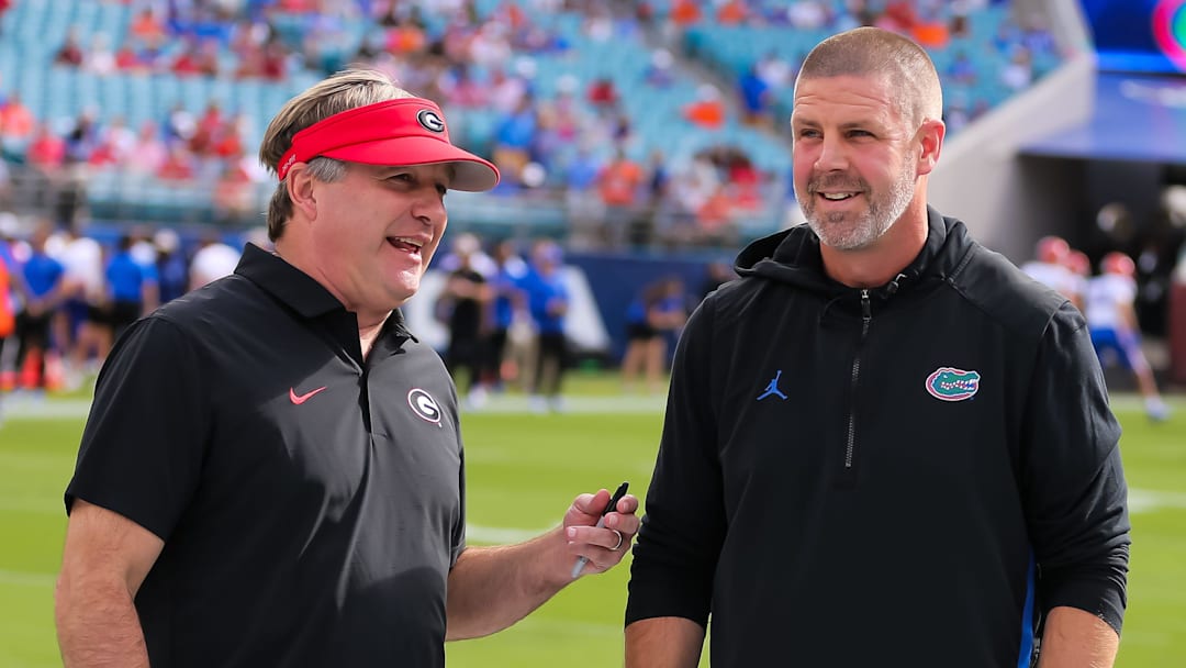 Georgia Bulldogs head coach Kirby Smart and Florida Gators head coach Billy Napier talk before the game before the first half at EverBank Stadium in Jacksonville, FL on Saturday, November 2, 2024. [Doug Engle/Gainesville Sun]