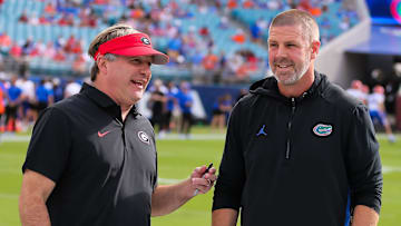 Georgia Bulldogs head coach Kirby Smart and Florida Gators head coach Billy Napier talk before the game before the first half at EverBank Stadium in Jacksonville, FL on Saturday, November 2, 2024. [Doug Engle/Gainesville Sun]