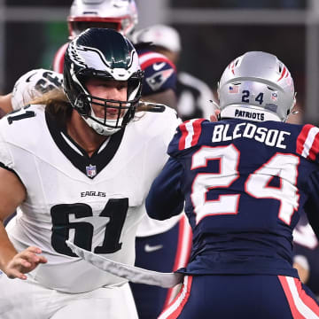 Aug 15, 2024; Foxborough, MA, USA; Philadelphia Eagles center Nick Gates (61) blocks New England Patriots safety Joshuah Bledsoe (24) during the first half at Gillette Stadium.  