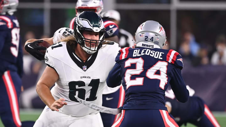 Aug 15, 2024; Foxborough, MA, USA; Philadelphia Eagles center Nick Gates (61) blocks New England Patriots safety Joshuah Bledsoe (24) during the first half at Gillette Stadium.  