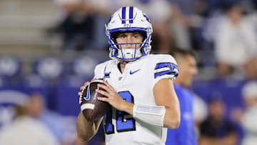 Sep 21, 2024; Provo, Utah, USA; Brigham Young Cougars quarterback Jake Retzlaff (12) warms up before the game against the Kansas State Wildcats at LaVell Edwards Stadium.