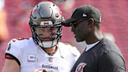 Oct 22, 2023; Tampa, Florida, USA;  Tampa Bay Buccaneers quarterback Baker Mayfield (6) speaks to head coach Todd Bowles Mandatory Credit: Nathan Ray Seebeck-Imagn Images