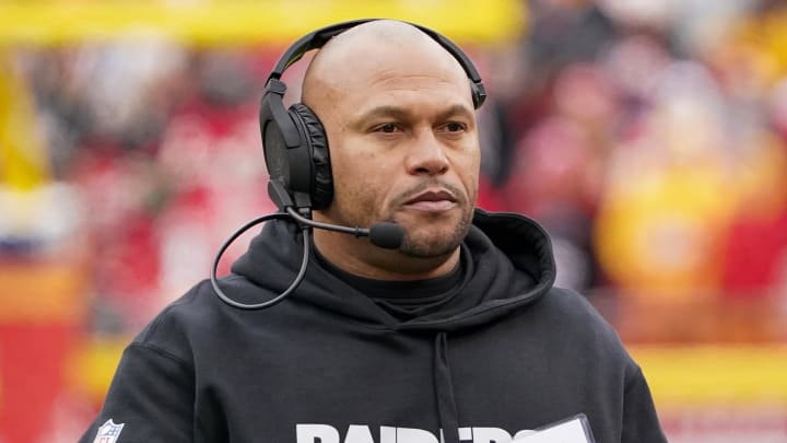 Dec 25, 2023; Kansas City, Missouri, USA; Las Vegas Raiders interim head coach Antonio Pierce on field against the Kansas City Chiefs during the first half at GEHA Field at Arrowhead Stadium.