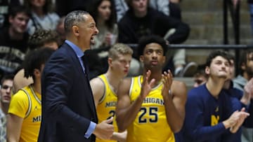 Michigan Wolverines head coach Juwan Howard yells down court during the NCAA men   s basketball game