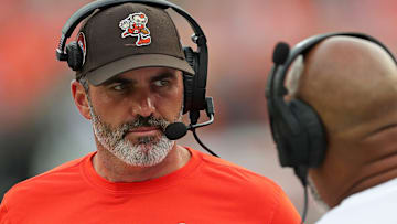 Cleveland Browns head coach Kevin Stefanski speaks with a member of his coaching staff during the second half of an NFL preseason football game at Cleveland Browns Stadium, Saturday, Aug. 10, 2024, in Cleveland, Ohio.