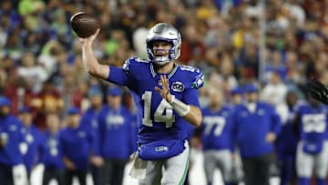 Seahawks quarterback Sam Darnold threw for 330 yards and four touchdowns in Sunday's win over the Commanders.