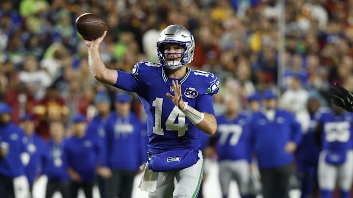 Seahawks quarterback Sam Darnold threw for 330 yards and four touchdowns in Sunday's win over the Commanders.