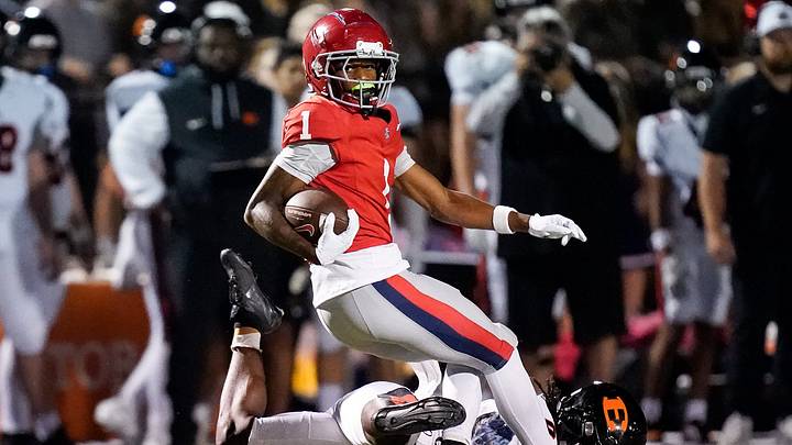 Brentwood Academy's Kesean Bowman (1) evades Ensworth's Bishop Starling (0) during the first quarter at Brentwood Academy in Brentwood, Tenn., Friday, Sept. 26, 2025.