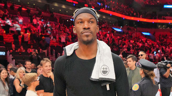 Miami Heat forward Jimmy Butler walks off the court following a win. Miami Heat forward Jimmy Butler walks off the court following a win.
