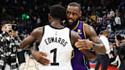 Mar 31, 2023; Minneapolis, Minnesota, USA; Minnesota Timberwolves guard Anthony Edwards (1) and Los Angeles Lakers forward LeBron James (6) hug after the game at Target Center. Mandatory Credit: Matt Krohn-Imagn Images
