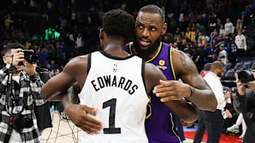 Mar 31, 2023; Minneapolis, Minnesota, USA; Minnesota Timberwolves guard Anthony Edwards (1) and Los Angeles Lakers forward LeBron James (6) hug after the game at Target Center. Mandatory Credit: Matt Krohn-Imagn Images