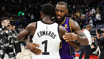 Mar 31, 2023; Minneapolis, Minnesota, USA; Minnesota Timberwolves guard Anthony Edwards (1) and Los Angeles Lakers forward LeBron James (6) hug after the game at Target Center. Mandatory Credit: Matt Krohn-Imagn Images