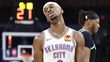 Mar 12, 2024; Oklahoma City, Oklahoma, USA; Oklahoma City Thunder guard Shai Gilgeous-Alexander (2) reacts during a time out against the Indiana Pacers during the second half at Paycom Center. Mandatory Credit: Alonzo Adams-Imagn Images