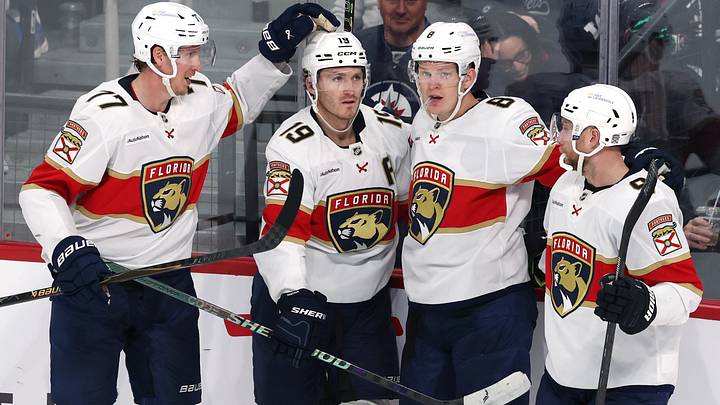 Florida Panthers left wing Brady Tkachuk (8) celebrates a goal against the Winnipeg Jets in the third period at Canada Life Centre.  Mandatory Credit: James Carey Lauder-Imagn Images