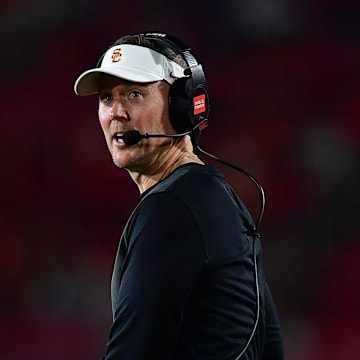 Sep 20, 2025; Los Angeles, California, USA; Southern California Trojans head coach Lincoln Riley watches game action against the Michigan State Spartans during the second half at the Los Angeles Memorial Coliseum. Mandatory Credit: Gary A. Vasquez-Imagn Images