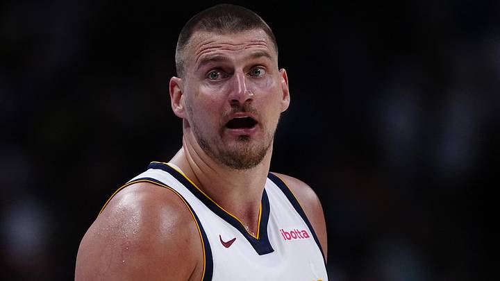 Apr 11, 2025; Denver, Colorado, USA; Denver Nuggets center Nikola Jokic (15) reacts in the fourth quarter against the Memphis Grizzlies at Ball Arena. Mandatory Credit: Ron Chenoy-Imagn Images