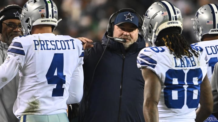 Philadelphia, Pennsylvania, USA; Dallas Cowboys head coach Mike McCarthy (M) celebrates with Cowboys quarterback Dak Prescott (4) and Cowboys wide receiver CeeDee Lamb (88) on the sidelines after a touchdown against the Philadelphia Eagles during the second quarter at Lincoln Financial Field