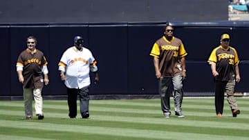 Former San Diego Padres players (from left) Steve Garvey Tony Gwynn Dave Winfield and Randy Jones are recognized during a retirement ceremony for closer Trevor Hoffman (not pictured) prior to the game against the Florida Marlins at Petco Park on Aug. 21, 2011.