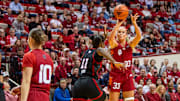 Indiana's Sydney Parrish (33) makes a three-pointer over Rutgers' Awa Sidibe (11) during the Indiana versus Rutgers women's basketball game at Simon Skjodt Assembly Hall on Thursday, Feb. 6, 2025.