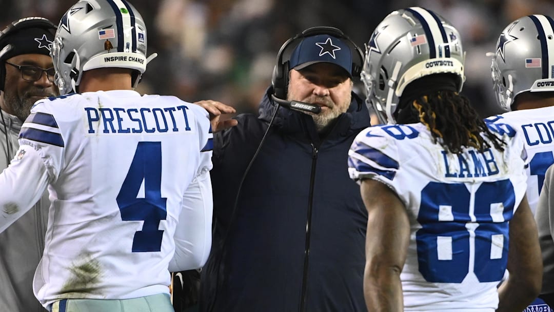 Jan 8, 2022; Philadelphia, Pennsylvania, USA; Dallas Cowboys head coach Mike McCarthy (M) celebrates with Cowboys quarterback Dak Prescott (4) and Cowboys wide receiver CeeDee Lamb (88) on the sidelines after a touchdown against the Philadelphia Eagles during the second quarter at Lincoln Financial Field. Mandatory Credit: Tommy Gilligan-Imagn Images