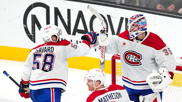 Dec 31, 2024; Las Vegas, Nevada, USA; Montreal Canadiens defenseman David Savard (58) congratulates goaltender Sam Montembeault (35) after the Canadiens defeated the Vegas Golden Knights 3-2 at T-Mobile Arena. Mandatory Credit: Stephen R. Sylvanie-Imagn Images