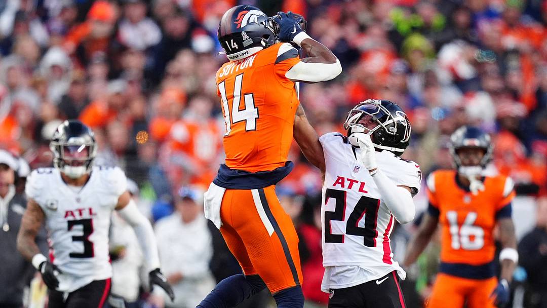 Nov 17, 2024; Denver, Colorado, USA; Denver Broncos wide receiver Courtland Sutton (14) pulls in a reception over Atlanta Falcons cornerback A.J. Terrell (24) in the second half at Empower Field at Mile High. Nov 17, 2024; Denver, Colorado, USA; Denver Broncos wide receiver Courtland Sutton (14) pulls in a reception over Atlanta Falcons cornerback A.J. Terrell (24) in the second half at Empower Field at Mile High.