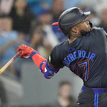 Toronto Blue Jays third baseman Vladimir Guerrero Jr. (27) hits a double against the St. Louis Cardinals during the fourth inning at Rogers Centre on Sept 13.