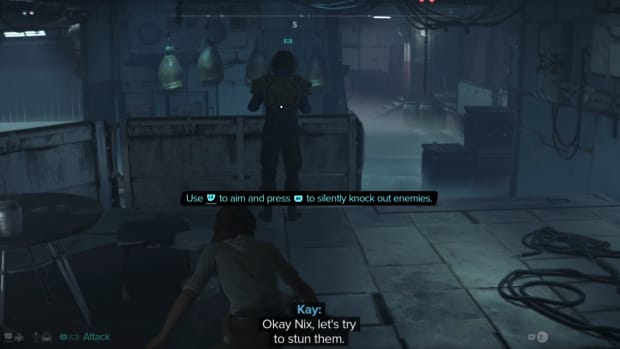 Screenshot of Kay sneaking behind a guard, preparing to stun him.