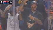 Buffalo Bills' Dion Dawkins cheers after a Sabres-Rangers fight on Dec. 11, 2024.