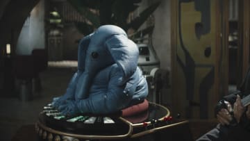 (L-R): Max Rebo and Bith guitarist in Lucasfilm's THE BOOK OF BOBA FETT, exclusively on Disney+. © 2021 Lucasfilm Ltd. & ™. All Rights Reserved.