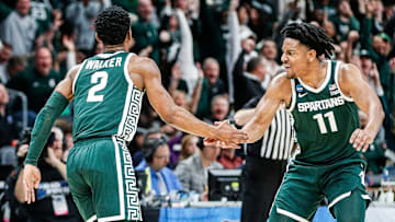 Michigan State guard Tyson Walker (2) celebrates a three point basket with guard A.J. Hoggard (11)