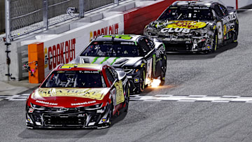 Feb 2, 2025; WInston-Salem, North Carolina, USA; NASCAR Cup Series driver Ty Dillon (10), NASCAR Cup Series driver Ty Gibbs (54) and NASCAR Cup Series driver Austin Dillion (3) during the last change qualifying race for the Clash at Bowman Gray at Bowman Gray Stadium. Mandatory Credit: Peter Casey-Imagn Images