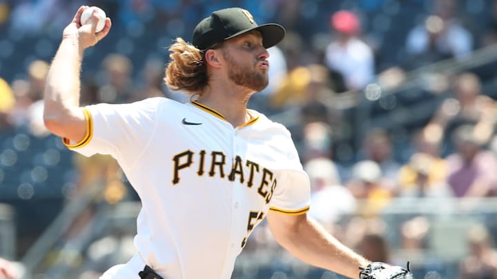 Jul 23, 2025; Pittsburgh, Pennsylvania, USA;  Pittsburgh Pirates relief pitcher Carmen Mlodzinski (50) pitches against the Detroit Tigers during the ninth inning at PNC Park. Mandatory Credit: Charles LeClaire-Imagn Images