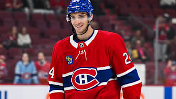 Oct 1, 2024; Montreal, Quebec, CAN; Montreal Canadiens defenseman Logan Mailloux (24) smiles during warm-up before the preseason game against the Ottawa Senators at Bell Centre. Mandatory Credit: David Kirouac-Imagn Images