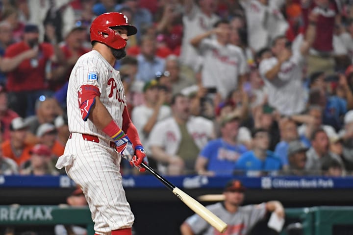 Philadelphia Phillies outfielder Kyle Schwarber watches his grand slam home run during the sixth inning.