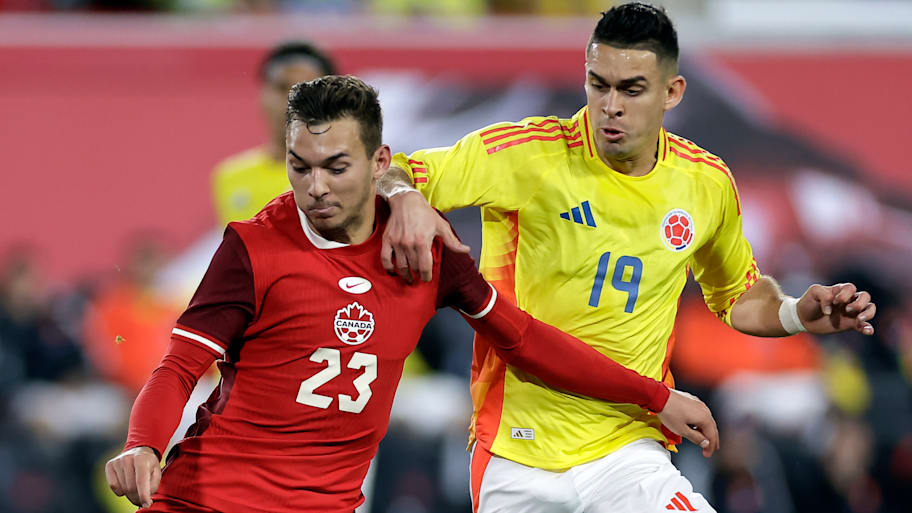 Niko Sigur battles for the ball