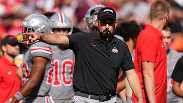 Oct 5, 2024; Columbus, OH, USA; Ohio State Buckeyes head coach Ryan Day leads warm-ups prior to the NCAA football game against the Iowa Hawkeyes at Ohio Stadium.
