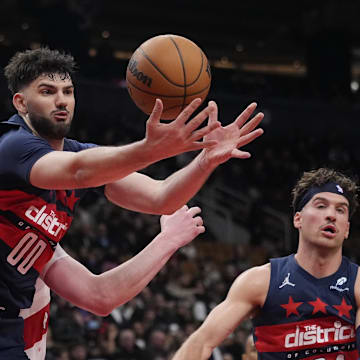 Mar 10, 2025; Toronto, Ontario, CAN; Washington Wizards forward Tristan Vukcevic (00) gets a rebound against the Toronto Raptors during the second half at Scotiabank Arena. Mandatory Credit: John E. Sokolowski-Imagn Images