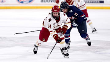 Sammy Taber breaks forward in a matchup with UConn during a matchup at Conte Forum